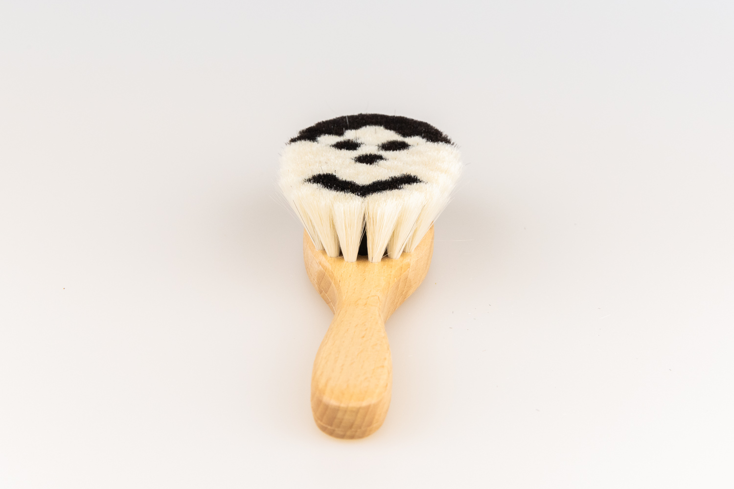 Babybürste Gesicht schwarz